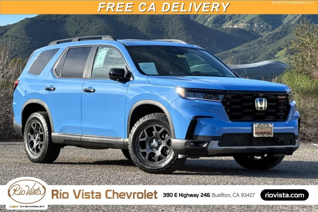 2025 Honda Pilot TrailSport in Blue — front three-quarter view