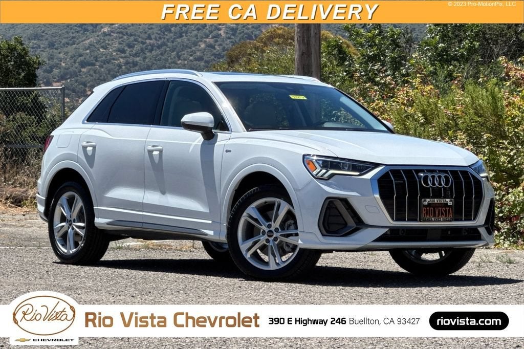 2022 Audi Q3 S line Premium Plus in White — front three-quarter view